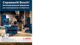 Чоловік на підлозі з інструментами Bosch Professional у синіх ящиках.