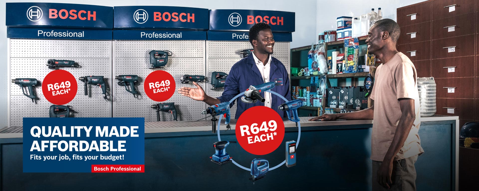 Two men at a Bosch tools counter, discussing various power tools for sale.